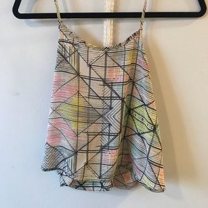 Slightly cropped, low back flow tank